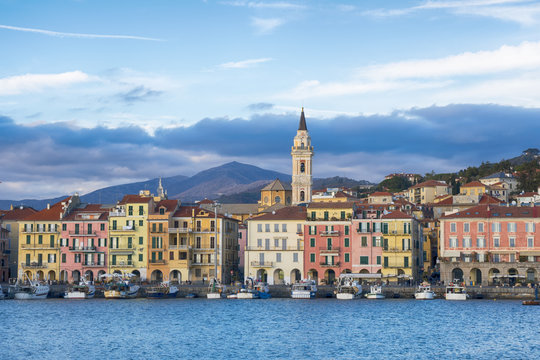 Oneglia colorful houses and the harbor, Imperia (Italy). Typical village of the Ligurian coast, mediterranean sea.