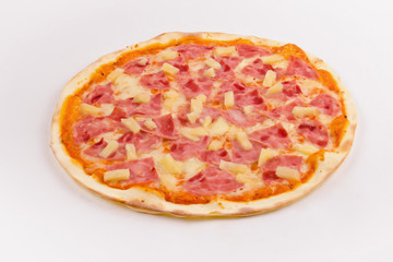 Pizza with ham and pineapple on a white background.