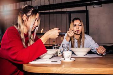 Two girl having lunch