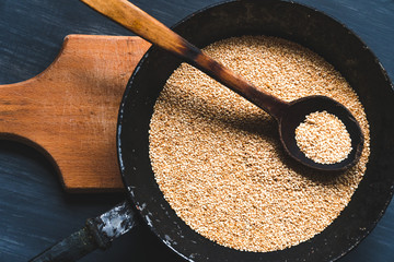 Toasted sesame seeds on a pan Vintage
