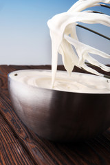 close up of a white whipped or sour cream in bowl