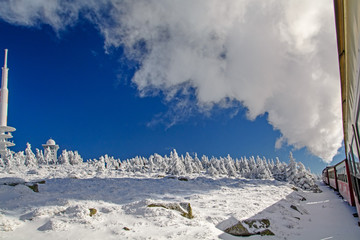 steam locomotive in winter on Mt. Brocken, Germany, Brockenbahn im Winter
