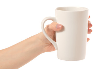 White mug in hands isolated