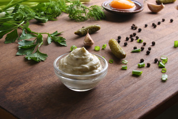 tartar sauce on a wooden background