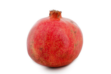 one whole red ripe pomegranate in the peel