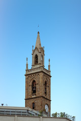 Fototapeta na wymiar Bell and Clock Tower in Barcelona