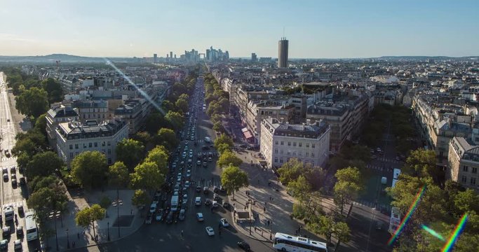 PARIS, FRANCE  &ndash; SEPTEMBER 2016 : Timelapse over central Paris cityscape on a beautiful day with view of traffic and skyline