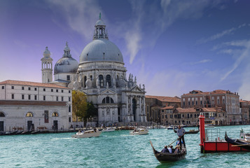 Fototapeta na wymiar Gondolier and Boats at Venice Church