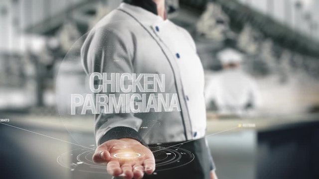 Chef holding in hand Chicken Parmigiana