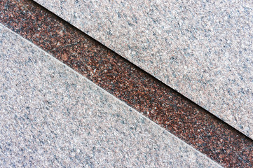 Marble wall with a diagonal stripe of marble of a different color. © Сергей Завальный