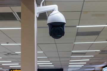 Modern CCTV security camera in office