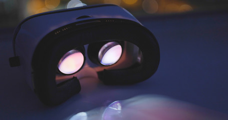 Virtual reality device in the city at night