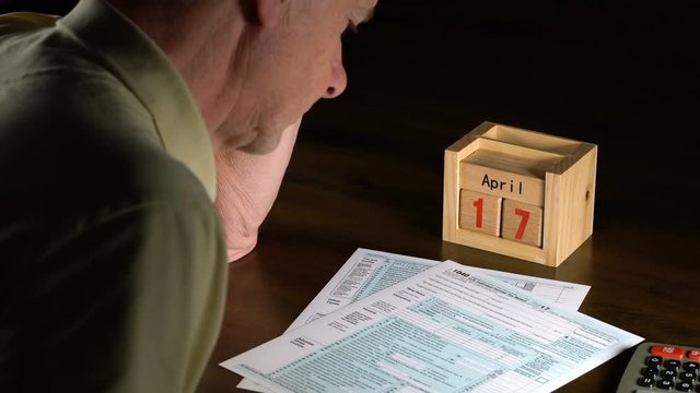 Senior adult man with tax return date of April 17, 2018