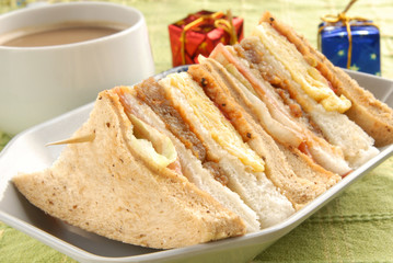 Club Sandwich on a white plate 