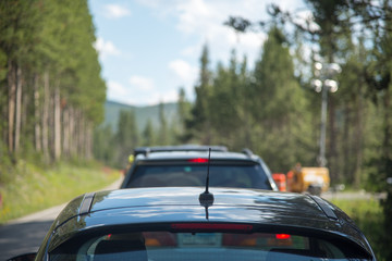 Vehicles Stopped Waiting on Road Construction on a Rural Road