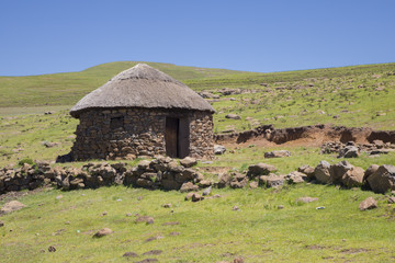 Traditional Basotho homes are round or rectangular-shaped structures made of stone and dung with roofs made of thatch (grass).