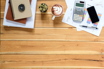 Office desk table with stack of business report paper file