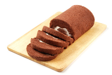 Swiss Roll  on the wooden cutting board      