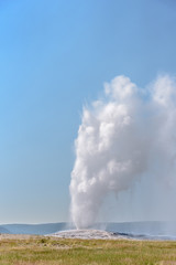 Eruption of Old Failthful Geyser at Yellowstone National Park
