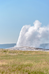 Eruption of Old Failthful Geyser at Yellowstone National Park