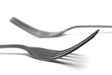 Two forks isolated on white background