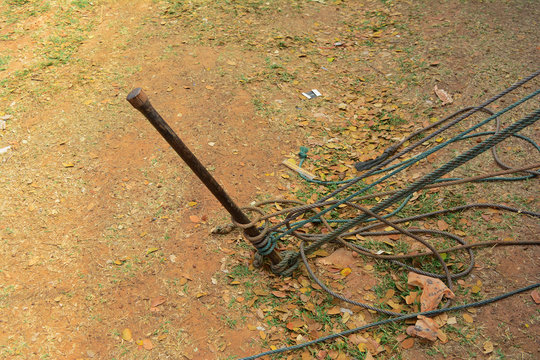 iron peg was hammered into soil and fasten with ropes