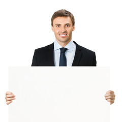 Happy businessman showing signboard, isolated