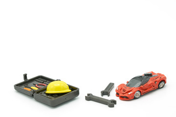 Fototapeta premium Car crash Models and Equipment Models There are yellow construction helmet models. Car and Repair . as background Repair concept with copy space for your text or design.