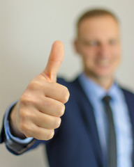 Business man hand with thumb up