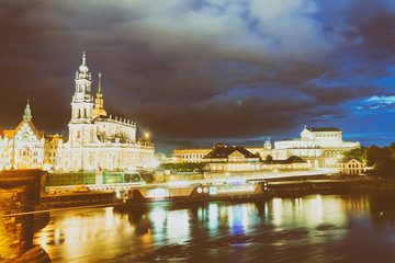Fototapeta na wymiar Night view of Dresden ancient buildings along Elba river