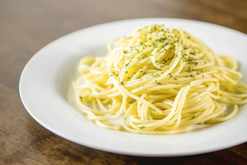 Italian spaghetti on white plate
