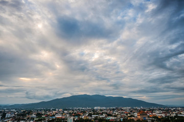Cityscape at evening with clouds skyline twilight and sunset