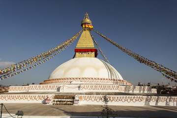 Boudhanath stupa in Kathmandu, Nepal. The Buddhist stupa of Boudhanath dominates the skyline, it is one of the largest stupas in the world