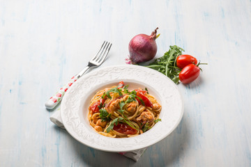pasta with fresh salmon tomatoes and arugula