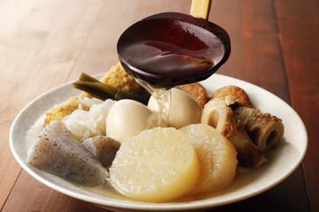 おでん　Japanese oden. vegetables, fish dumplings and various other articles of food stewed in a thin soy soup.