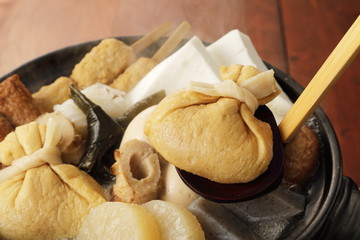 おでん　Japanese oden. vegetables, fish dumplings and various other articles of food stewed in a thin soy soup.