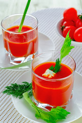 Tomato juice in two glasses.