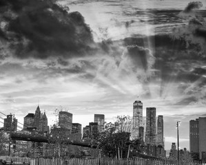 The Brooklyn Bridge in New York City with Manhattan skyline on background