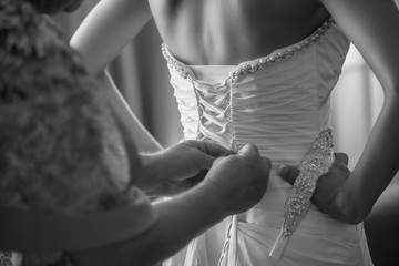Bride Getting Dressed for her Wedding