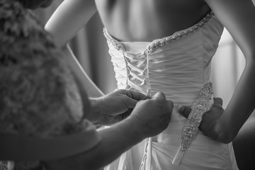 Bride Getting Dressed for her Wedding