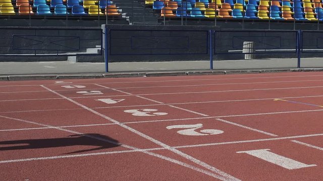 Caucasian athlete at last breath crosses finish line and becoming winner of race