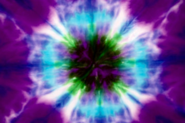 Blurred tie dyes fabric in colorful pattern for background
