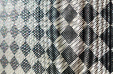 Plastic texture in the form of a very small cloth binding, painted in black and gray in the style...
