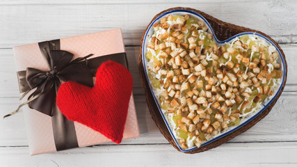 salad in the form of heart on Valentine's day and the gift in the box