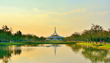 Fototapeta na wymiar Beautiful public parkland Suan Luang R.9 in Bangkok Thailand,beautiful sunset of reflection pavilion and tree