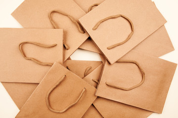 Many brown paper bags with handles closeup shot