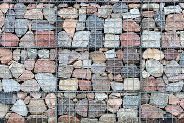 Gabion wall made of natural stone and metal mesh