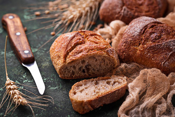 Fresh homemade buns on rustic background
