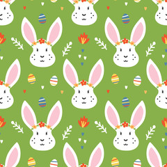 Cute vector seamless pattern background for Easter with rabbit, colorful eggs and floral elements.