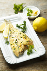 Flatfish, baked with lemon and herbs